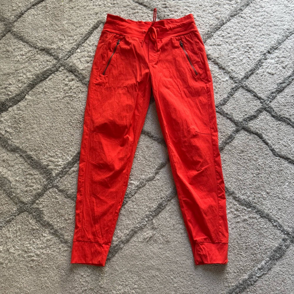 Athleta Trekkie North Jogger pants Orange Zip Pocket Drawstring athletic 2